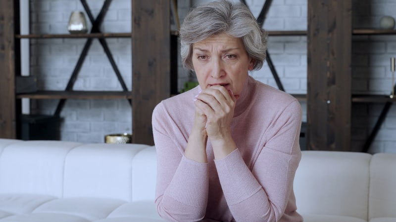 pensive woman sitting at home, from Viktoria Korobova. Life can throw us curveballs and knock us off track. This successful survivor can reframe the narrative to realize her wins.