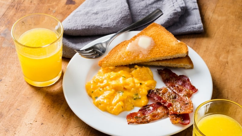 These French-style scrambled eggs with rosemary candied bacon elevate a basic meal to an extravagantly divine breakfast or brunch!