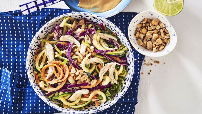 Joy Howard, EatingWell, provides this recipe for zucchini noodle salad with peanuts and peanut sauce