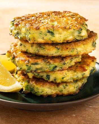 These fluffy, savory zucchini pancakes are packed with shredded zucchini, herbs and salty bites of feta cheese.
