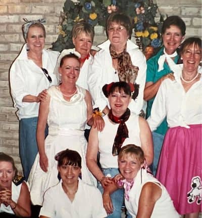 Sisters dressing up in 1950s poodle skirt dance style, for article from Barbara Lane in "Broken Water" on boomer music