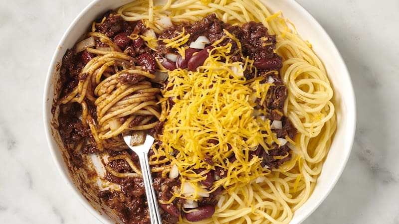 This Midwestern specialty, called Cincinnati chili, has beans and is typically served over a bed of spaghetti.