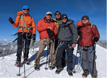 At the summit with the team, for lessons from Breithorn