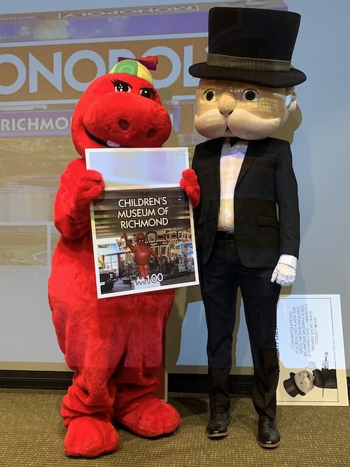 Seymore, the mascot of Children's Museum of Richmond, with Mr. Monopoly