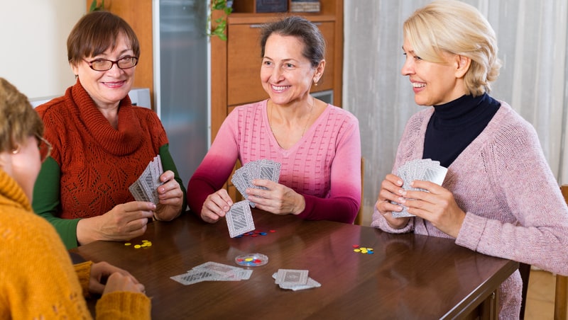 women playing bridge, image by Iakov Filimonov. Article giving advice after one friend cuts ties mysteriously, after 25 years of playing bridge together.