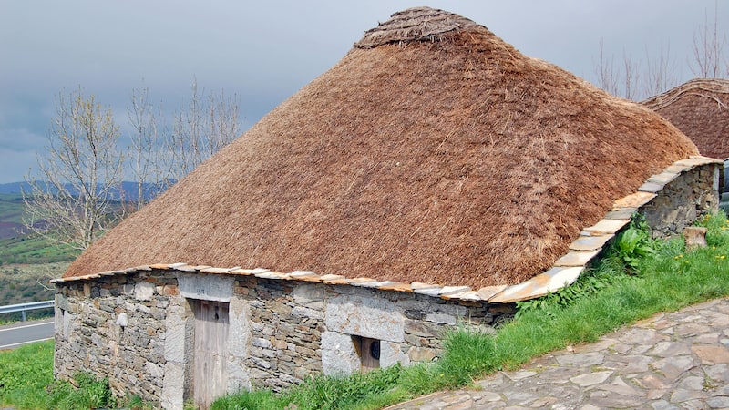 The humble palloza, a round stone hut with a peaked thatched roof, dates back to Celtic times about 1,500 years ago. In the Spanish hamlet of O Cebreiro, on the Camino de Santiago pilgrimage route, residents lived in pallozas until as recently as the 1960s. CREDIT: Rick Steves.