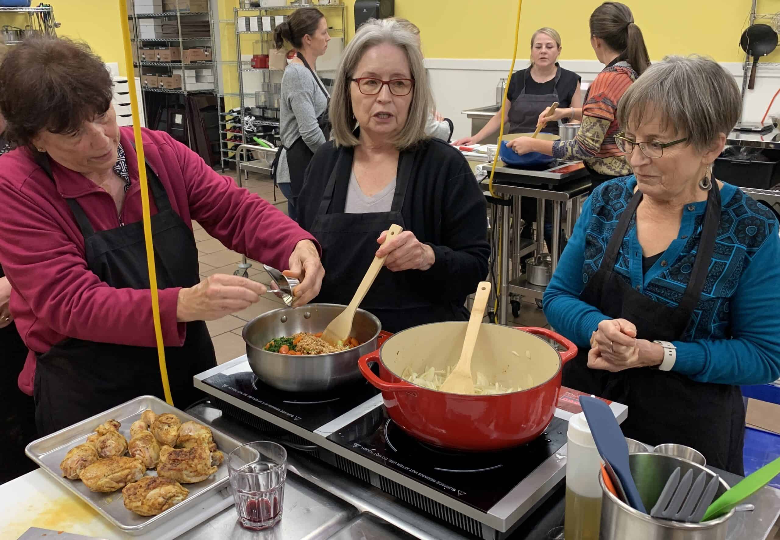 students working together in a cooking class at The Kitchen Classroom, Richmond, Virginia