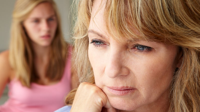 unhappy daughter and mother, image by Monkey Business Images. Article: 54-Year-Old Mother Wants Another Child