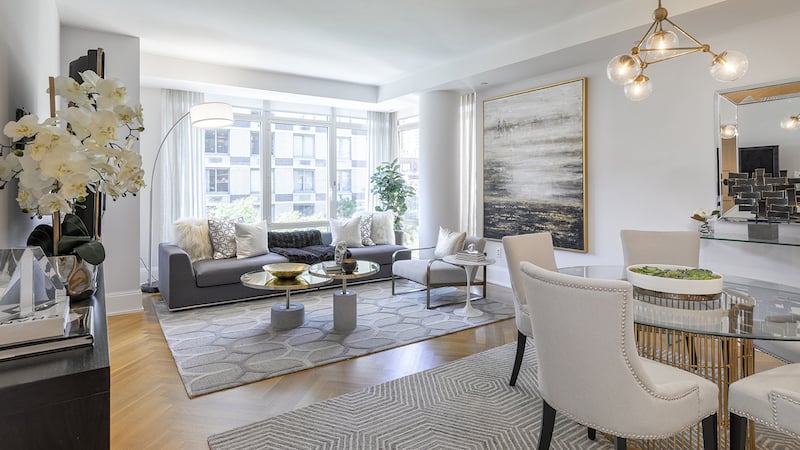 A glass top dining table helps to add a light element to this dining area. (Handout/TNS)