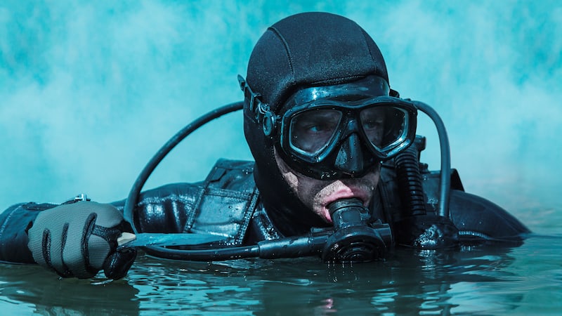 A Navy SEAL frogman in the water. For Ask Amy, Son’s SEAL Plans Worry His Parents