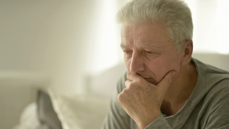 A sad, contemplative older man. Image by Ruslan Huzau. Article on marital reconciliation