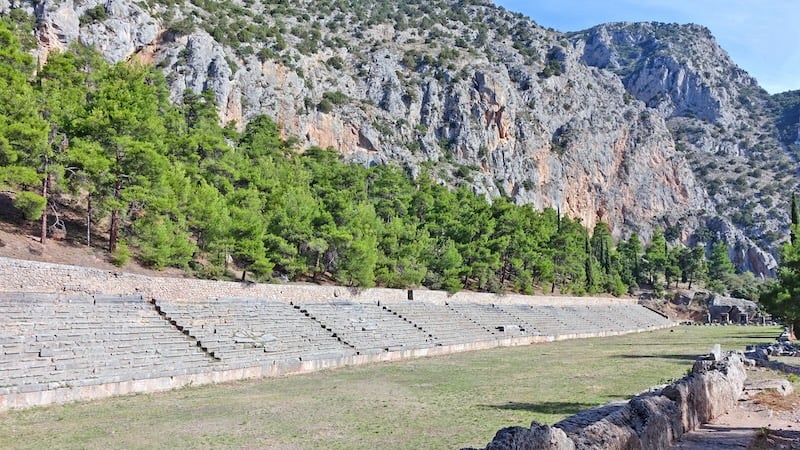 Every four years, athletes and musicians would congregate at Delphi&apos;s stadium for the Pythian Games to honor Apollo ‚Äì and win a coveted laurel wreath. For article on Greek ruins