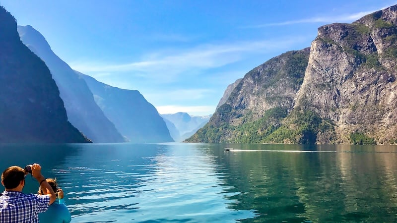 Norway’s rugged west coast is slashed by fjords — stunning inlets carved out by ancient glaciers. Of these, the Sognefjord – Norway’s longest (120 miles) and deepest (1 mile) – is tops. Ferries and catamarans connect visitors and locals alike to several of this sparsely populated region’s scenically situated villages and towns. For article on Norway’s fjord country. CREDIT: Rick Steves.