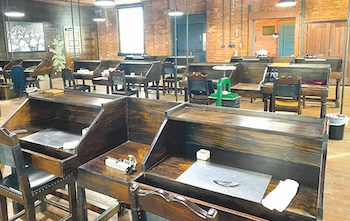 Take a tour at J.C. Newman Cigar Co. and see cigar rollers at work.