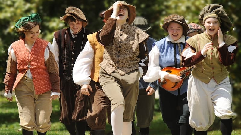Young people dressed in Elizabethan garb for a Shakespeare festival
