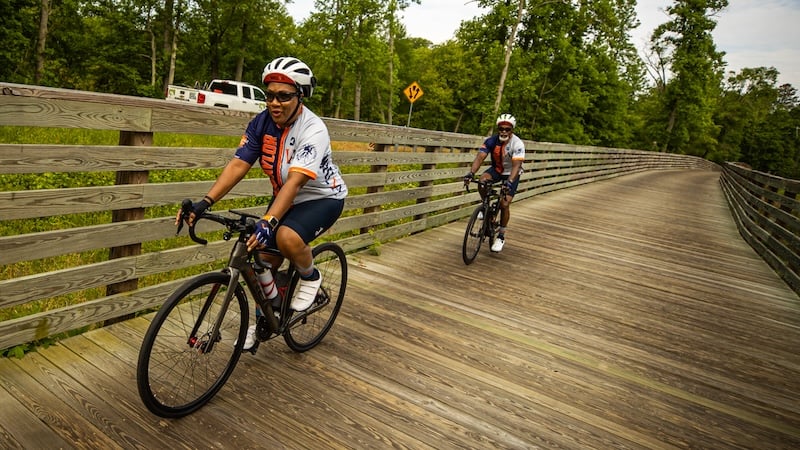 Two cyclists as part of the Cap2Cap bike event along the Virginia Capital Trail