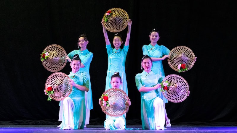 Asian American dancers, as part of the Asian American Celebration in Richmond, Virginia, for "What's Booming RVA: A Global Week"