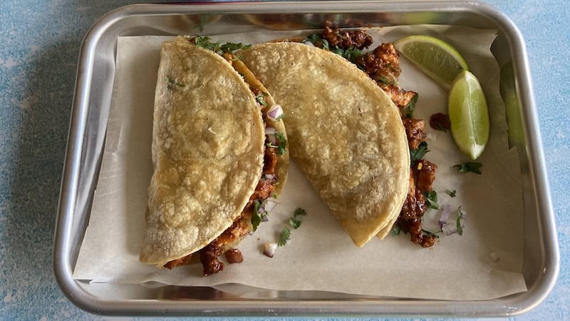 Crispy Chicken Tacos: The doubled tortilla stack easily holds spoonfuls of the chorizo and chicken filling.