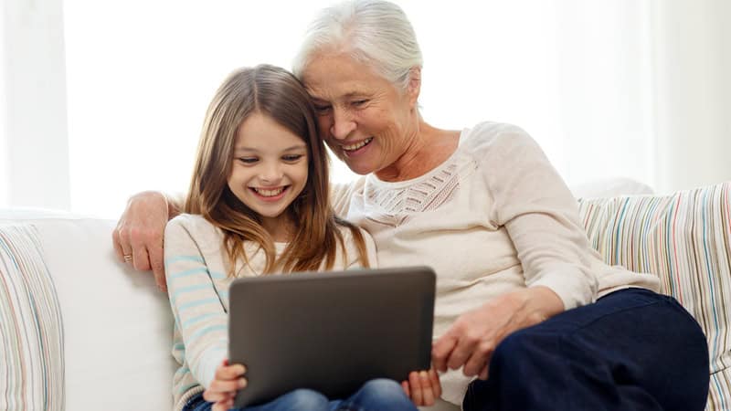grandmom and girl on tablet together - image by Syda Productions (used with Jumble Puzzle: Talking Trees)