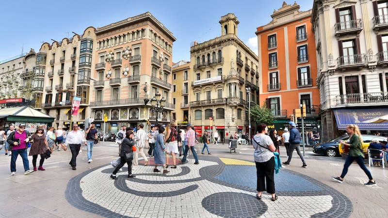 Public art, such as Joan Miró’s mural on the Ramblas, fits seamlessly into the street life of creative Barcelona. CREDIT: Cameron Hewitt, Rick Steves’ Europe.