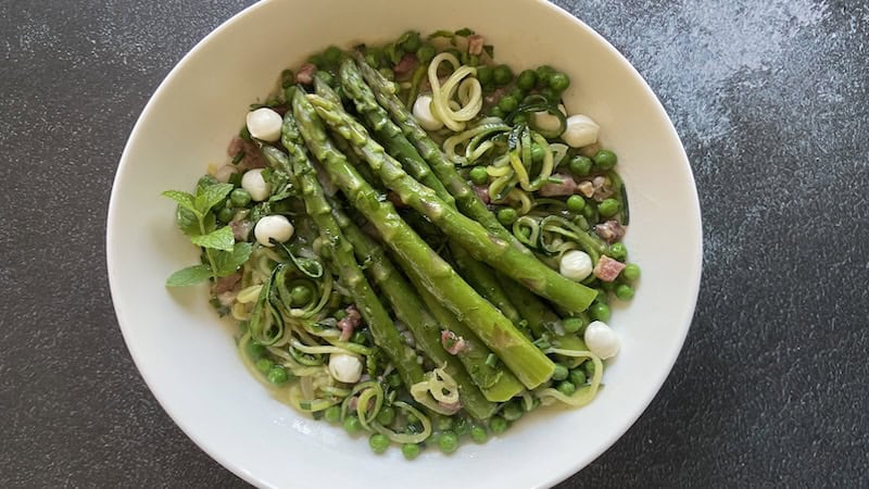 Make the most of fresh spring produce with Spring Vegetable Stew. Asparagus, herbs, sweet peas, zucchini, and herbs are complemented by fresh mozzarella and pancetta, bacon or prosciutto for savory goodness.