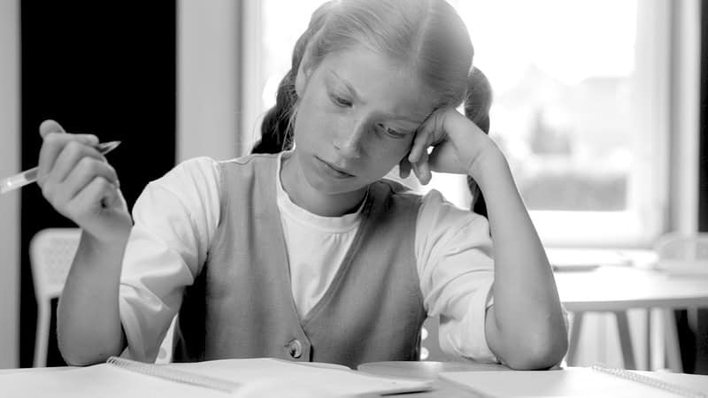 sad girl in school, representing a late-diagnosis ADHD. Image by Yuliia Kaveshnikova