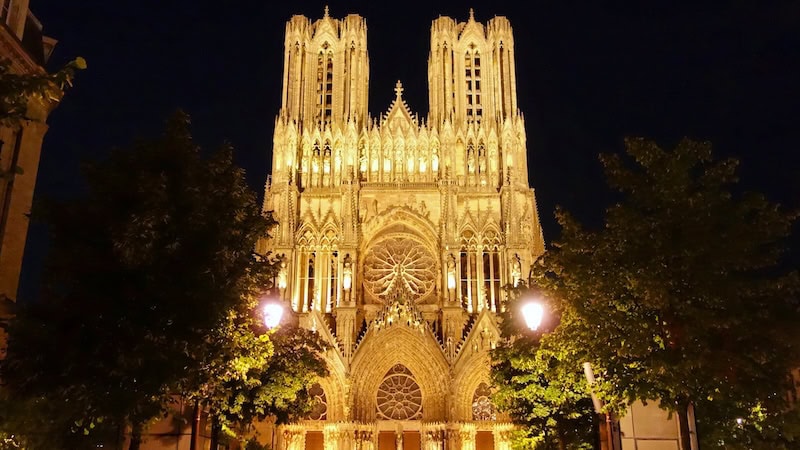 Reims Cathedral's 260-foot-tall towers were added in the 1400s, about 200 years after the church's construction; the spires intended to top them were never installed for lack of money. (Rick Steves, Rick Steves' Europe). In intoxicating Reims, France