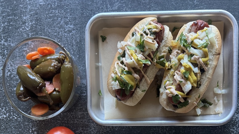 Bacon-Wrapped Griddled Hot Dogs with Black Beans and Spicy Mayo