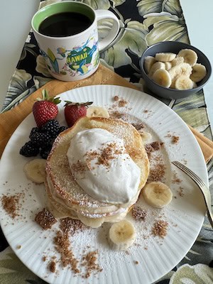 Banana Cream Pie Pancakes: Coconut whipped cream gilds the pancake stack, while crumbled graham crackers call to mind the crunchy crust on a traditional pie. (JeanMarie Brownson/TCA)