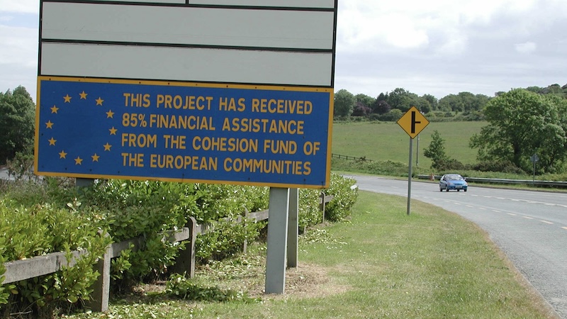 Signs like this line freeways across the 27 countries of the European Union, reminding drivers where the funding came from, demonstrating one way the EU impacts travelers. CREDIT: Rick Steves, Rick Steves’ Europe.