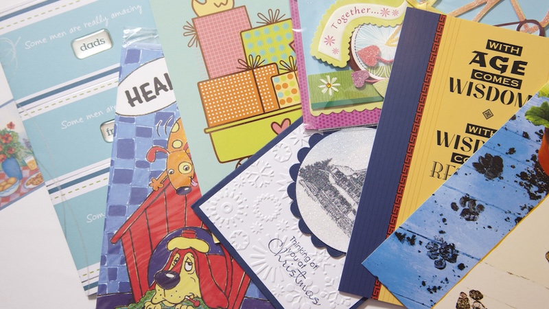 A collection of greeting cards, appropriate for the question: How long should you keep greeting cards?