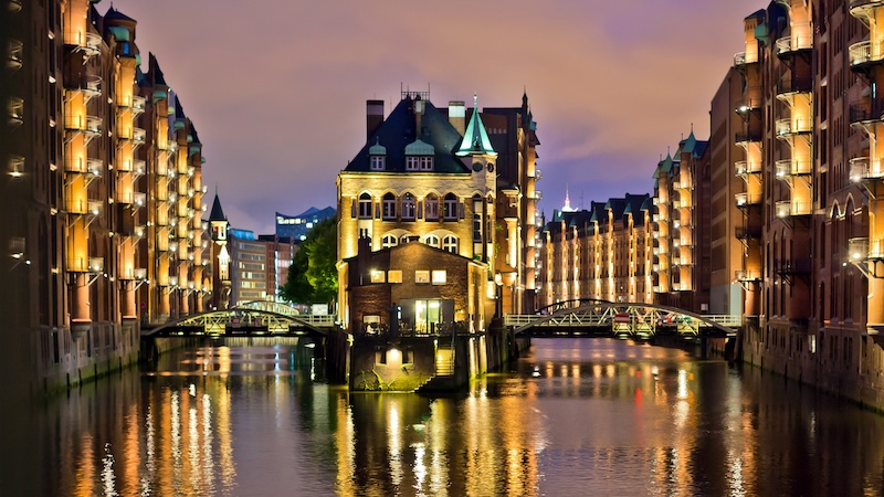 Speicherstadt, Hamburg’s old red-brick warehouse district on the Elbe River, now houses museums and other attractions, part of the captivating culture in Hamburg. CREDIT: Dominic Arizona Bonuccelli, Rick Steves’ Europe.