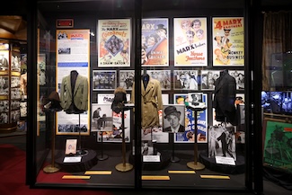 Some items in the Marx Brothers exhibit, including Chico’s hat, Harpo’s coat, wig and horn, and Groucho’s glasses and jacket. PHOTO CREDIT: Sheri Determan, Courtesy Hollywood Museum.