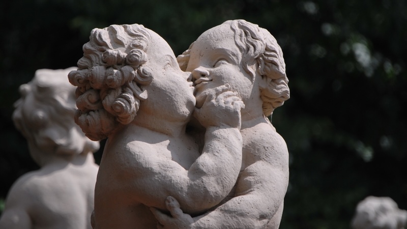 Two cherubs kissing at Zwinger Dresden, Germany, their act caught forever into the future, like the kiss-cam victims at the Coldplay concert. By SenatorJoanna