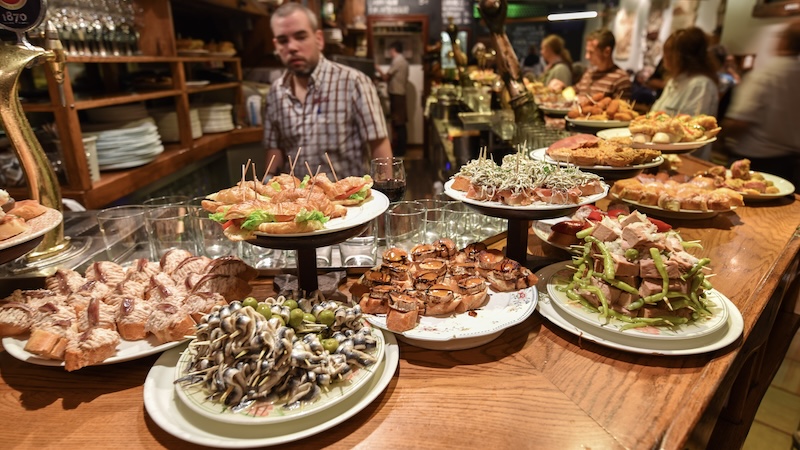 With sunny beaches, spectacular modern architecture, tasty tapas, and feisty, free-spirited people, Basque Country is filled with cultural treats. In cities like San Sebastián, bars offer plenty of pintxos– the Basque Country’s version of tapas. CREDIT: Cameron Hewitt, Rick Steves’ Europe.