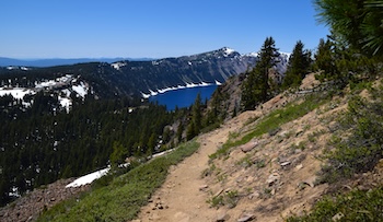 Partial view of Crater Lake in Oregon from the trail to the rim. Image by Nick Thomas