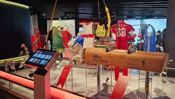 Gear and uniforms at the Olympic Museum, an example of a site for multigenerational travel in Switzerland