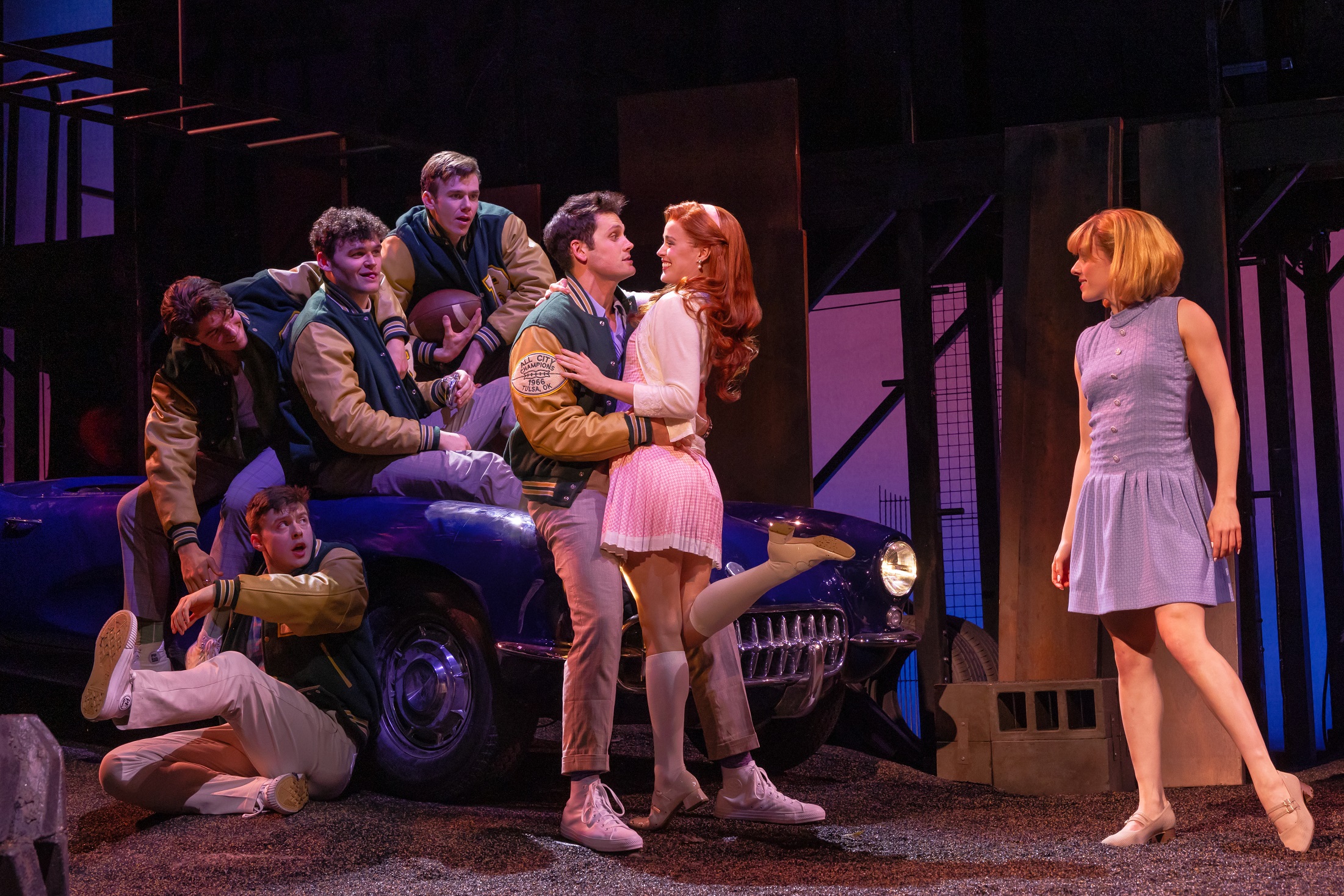 The Outsiders. Photo by Matthew Murphy. Pictured: THE SOCS (top row) Barton Cowperthwaite (Brill), Dan Berry (Paul), RJ Higton (Chet), Kevin William Paul (Bob), Emma Pittman (Cherry Valance), Melody Rose (Beverly); (Front Row) Sean Harrison Jones (Tripp).