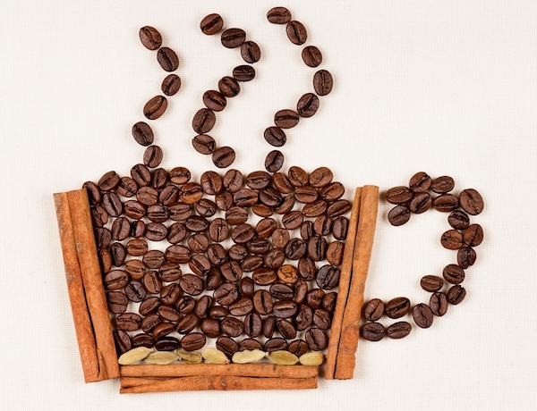 Coffee arts - cinnamon sticks make the cup and coffee beans make the coffee, steam, and handle. By Prokofyev