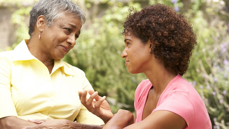 A mother and daughter or daughter-in-law talking lovingly outside. For article on mother-in-law names.
