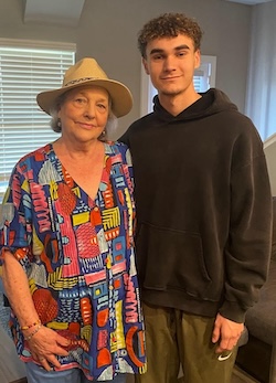 Woman being grateful with a grandson.