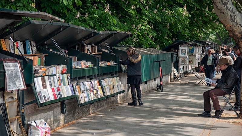 In Paris, “bouquinistes” sell used books and memorabilia from green metal stalls that line the Left Bank of the Seine River. CREDIT:(Cameron Hewitt, Rick Steves’ Europe). Bibliophiles don’t leave their love for books behind when they travel! Travel pro Rick Steve shares his picks in Europe for bookworms.