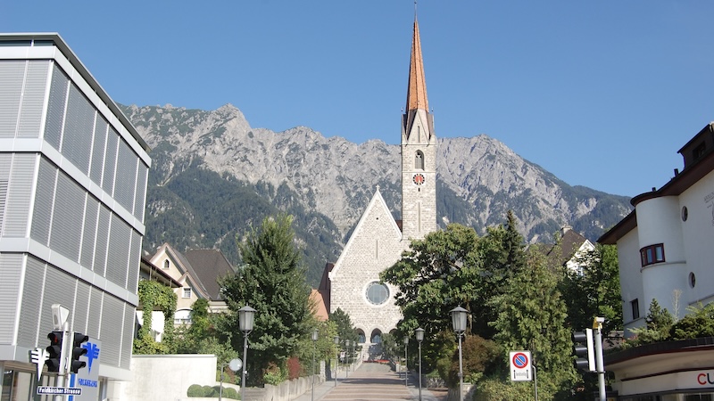 In Liechtenstein’s towns, it’s common to see quaint churches bumping up against modern business buildings. CREDIT: Rick Steves, Rick Steves’ Europe.