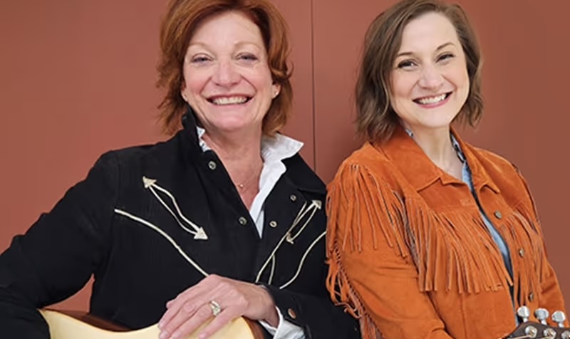 Actors portraying Loretta Lynn and Patsy Cline, for What's Booming: Music and Espionage.