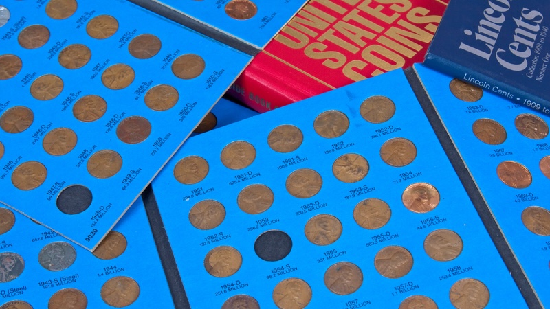 Coin collecting books filled with the penny collectibles