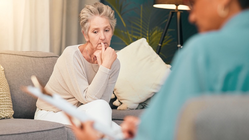woman in a therapy session dealing with a rocky relationship with her stepdaughter