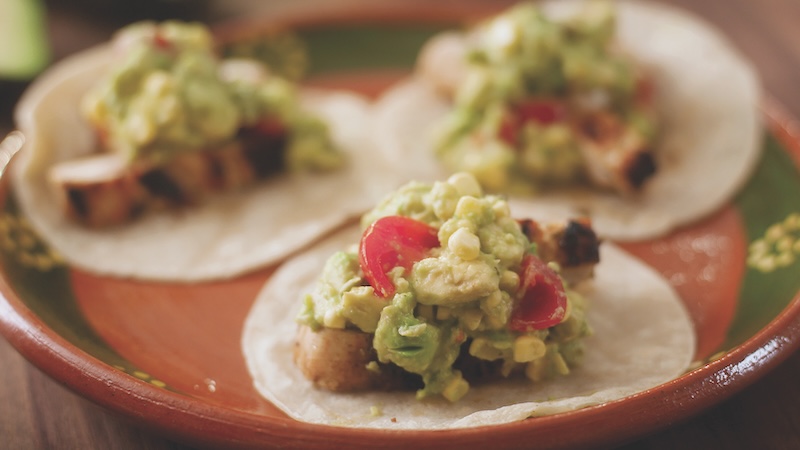 Lime-Rubbed Chicken Avocado Tacos with corn guacamole
