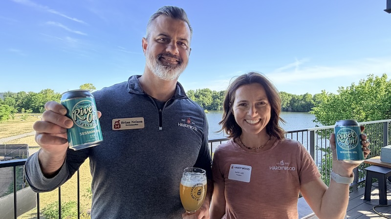 Brian Nelson, brewmaster, and Kate Lee, president, with Hardywood River On session IPA.