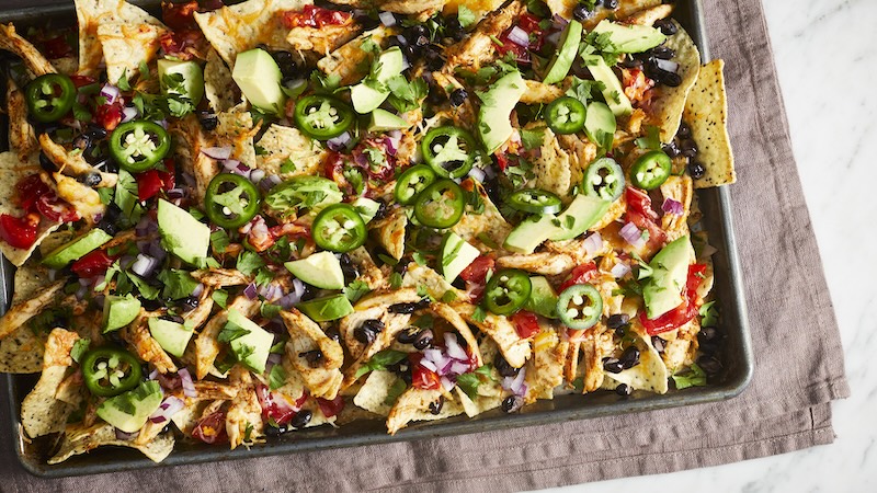 Easy chicken nachos. Photographer: Jennifer Causey Food Stylist: Chelsea Zimmer Prop Stylist: Lydia Pursell