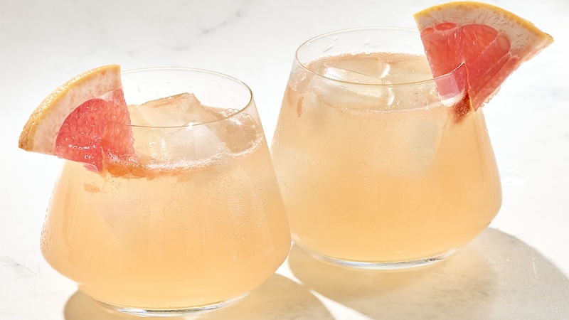 Two grapefruit mule cocktails with a grapefruit wedge garnish in each. What makes a Moscow Mule even better? Adding fresh grapefruit juice. (Alex Lepe/TCA)